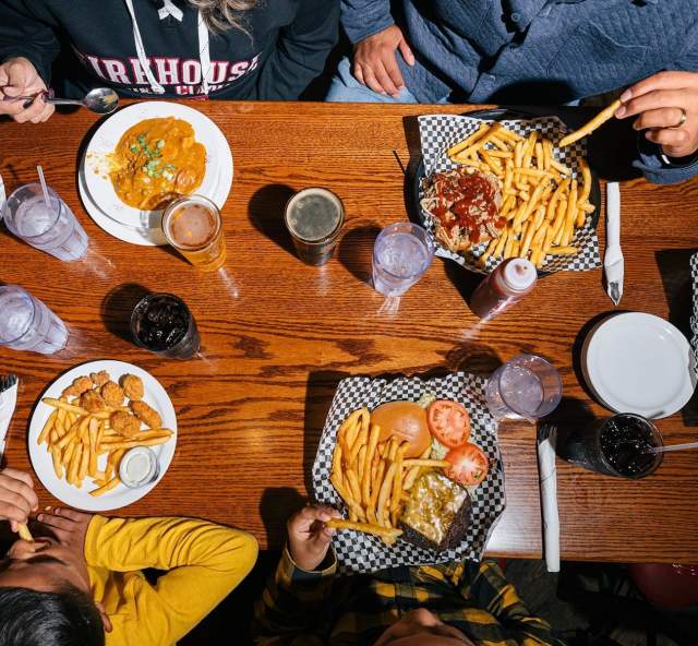 Overview of a table full of food from the Firehouse Brewing Company Menu in Rapid City, South Dakota