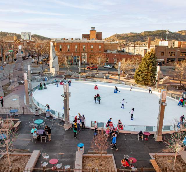 birds eye view of the main street square ice skating rink with skaters in rapid city, sd