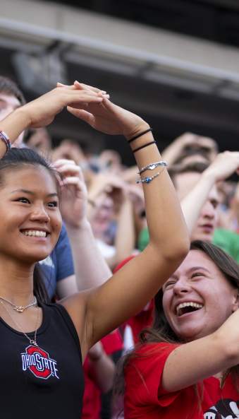 Fans cheering on the Buckeyes at Ohio Stadium