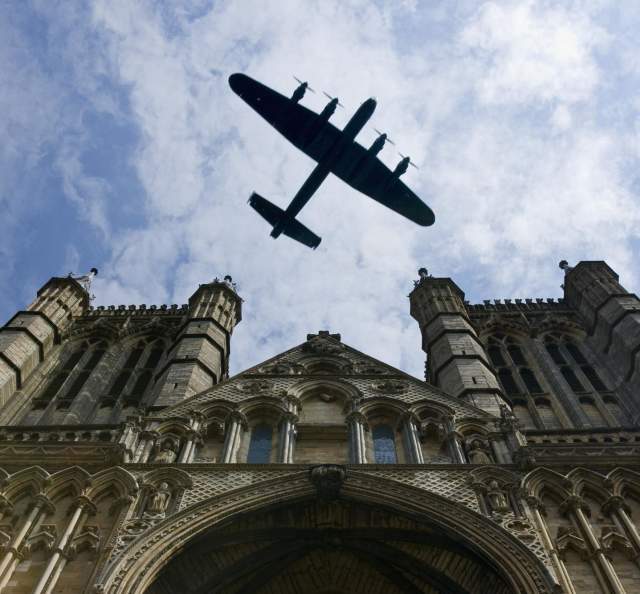 Aviation Lancaster Flyover Lincoln Cathedral with blue skies