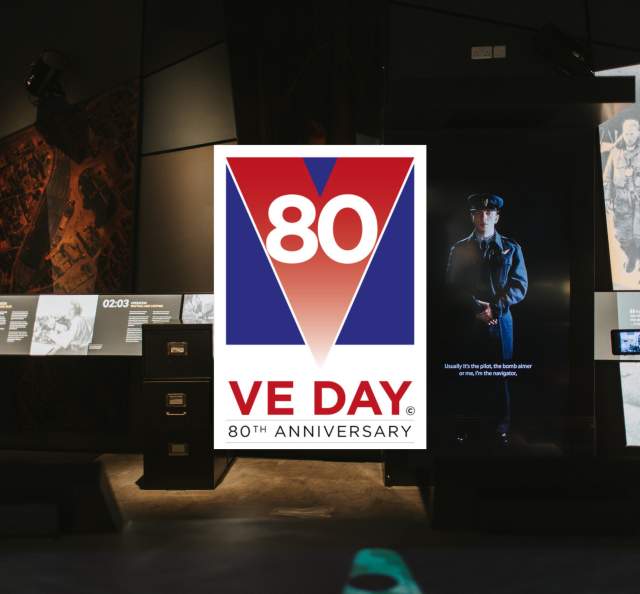 A logo that reads VE Day 80 overlaying a WW2 museum exhibition