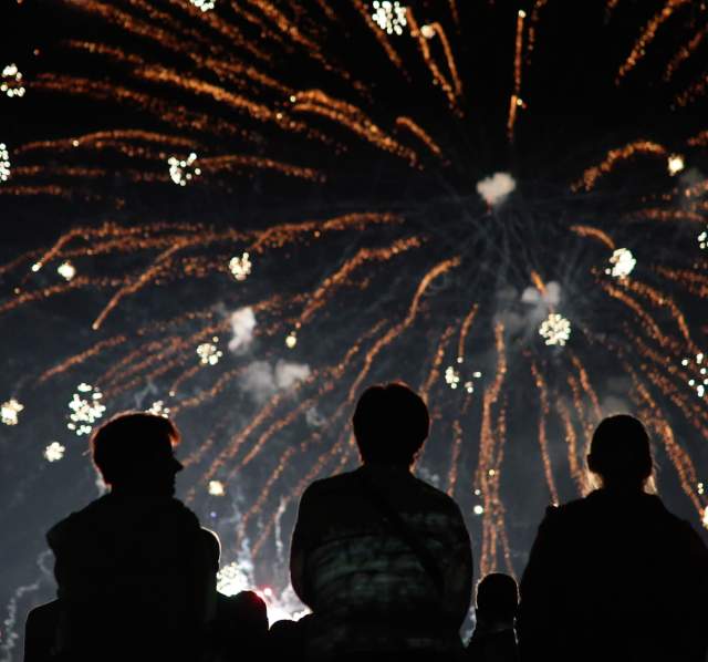 People watching fireworkds