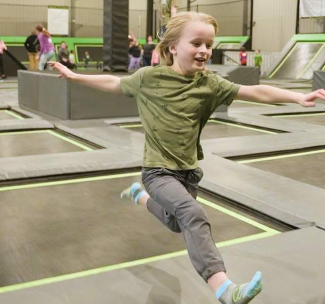 Boy jumps at Sawmill Trampoline Park