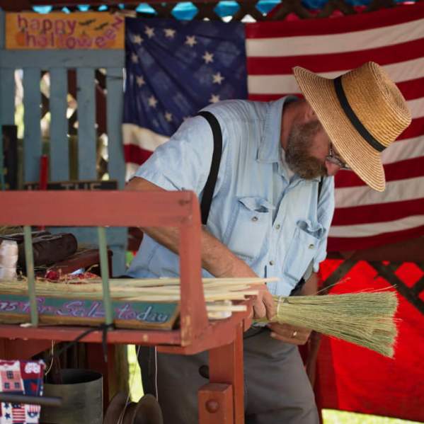 Man making a broom at Kutztown-Folk-Festival