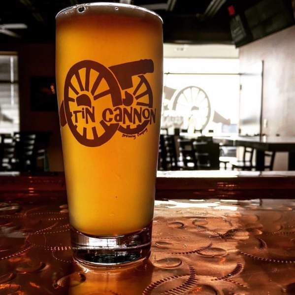 A glass with beer in it