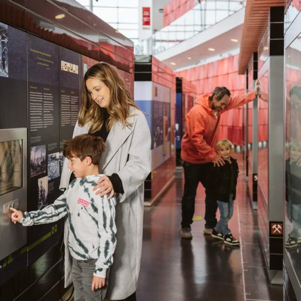 young family exploring the displays in the national waterfront museum