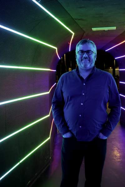 Simon Jackson stood in the light up tunnel to 42s nightclub