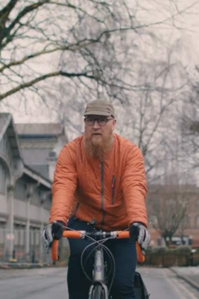 Nick riding a bike in Manchester