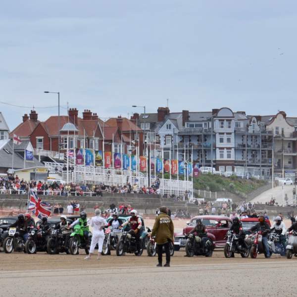 Vintage vehicles lined up along Bridlington's south beach for the start of Race the Waves