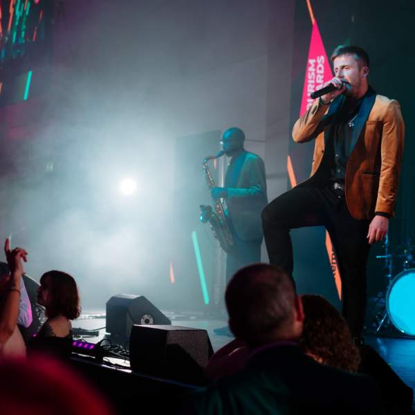 Singer and saxophonist performing at the REYTAs 2024