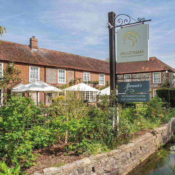 an exterior view of The Millstream hotel in Bosham, West Sussex