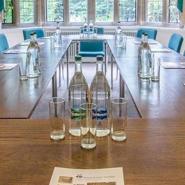 A meeting room in a boardroom style at Westminster College, Cambridge