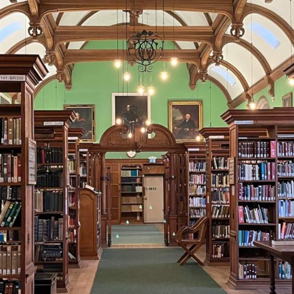 Old Cambridge College library with apple green walls