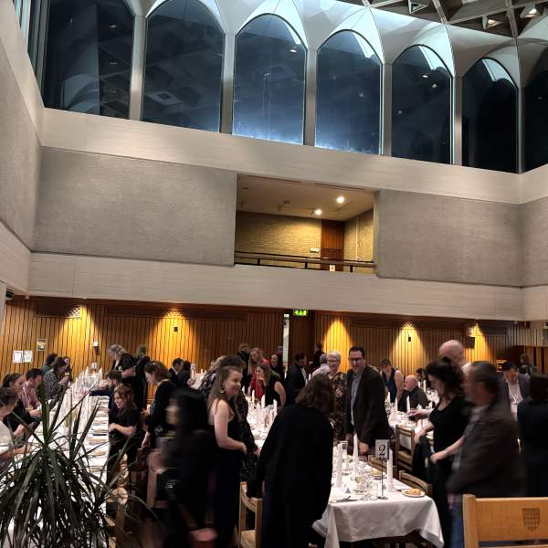 Delegates waiting to sit for their formal dinner at Fitzwilliam College