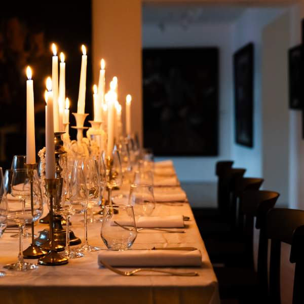 Candlelit table set for a supper club evening in Northern Ireland.