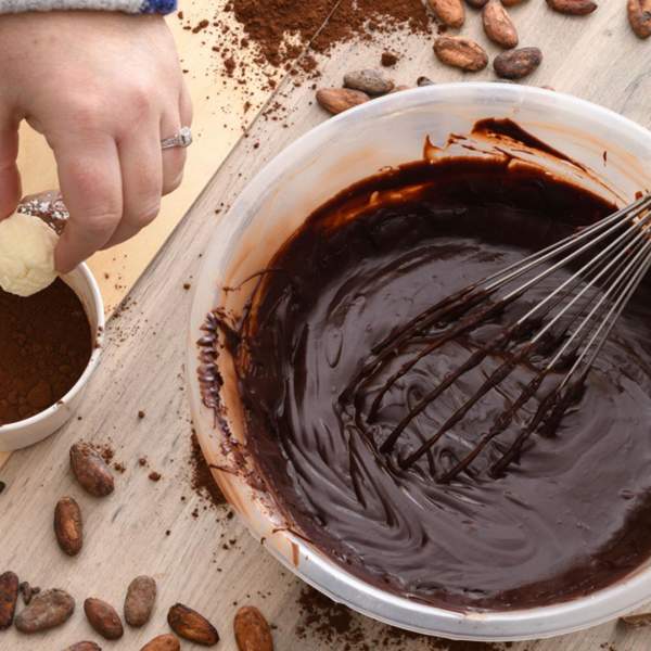 A bowl of melted chocolate and truffles at The Chocolate Manor