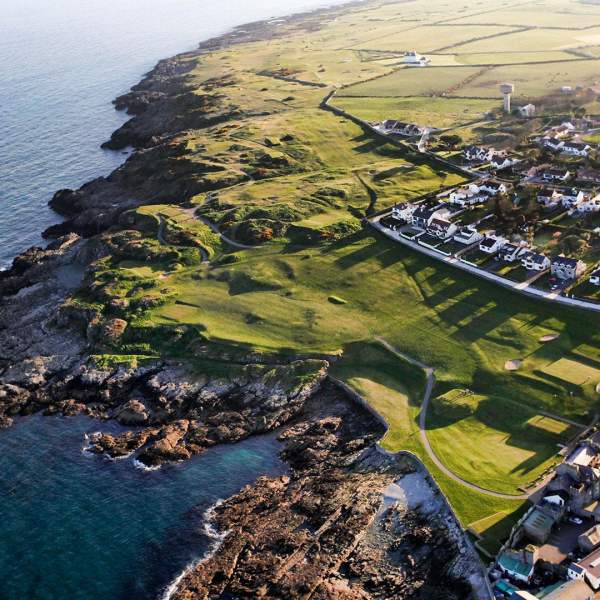 Aerial view overlooking the rocks and sea by the Ardglass Golf Club