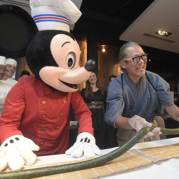Chef Masaharu Morimoto and Mickey Mouse at the Grand Opening of Morimoto Asia restaurant in Disney Springs