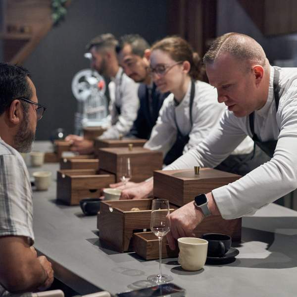 Chef Ryan Ratino (Far Right) at Winter Park’s One-MICHELIN-Star ÔMO by Jônt.