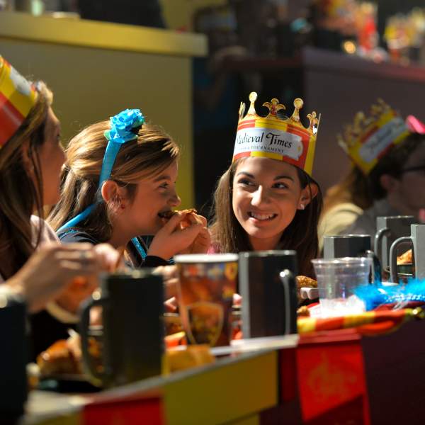 Family enjoying show at Medieval Times Dinner & Tournament
