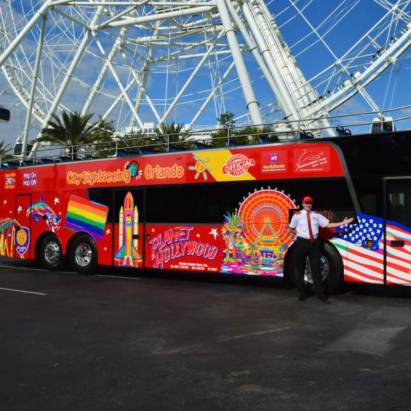 City Sightseeing tour bus in front of the Coca-Cola Orlando Eye