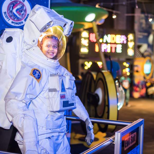 WonderWorks girl in astronaut suit