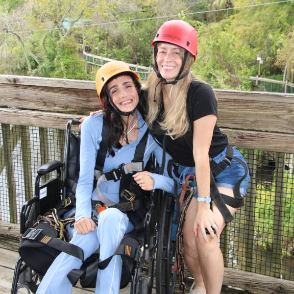 Accessibility influencer Amanda Perla experiences the Gator Gauntlet accessible zip line at Gatorland