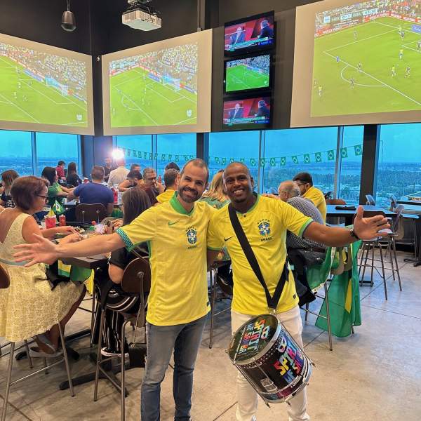 Celebrating at a soccer watch party with Brazilian shirts