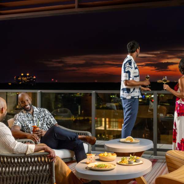 Couples lounge with a fireworks view at Ceiba