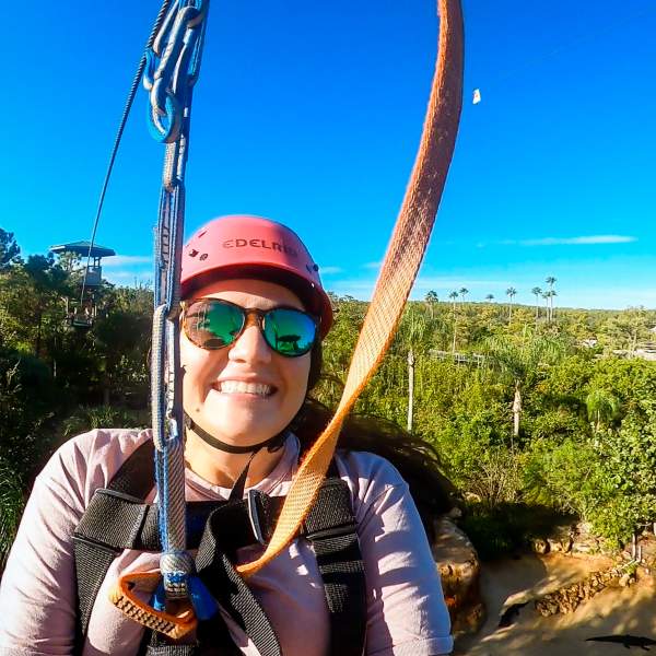 Visit Orlando employee at Gatorland zipline adventure