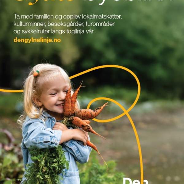 Jente som omfavner en bunt gulerøtter