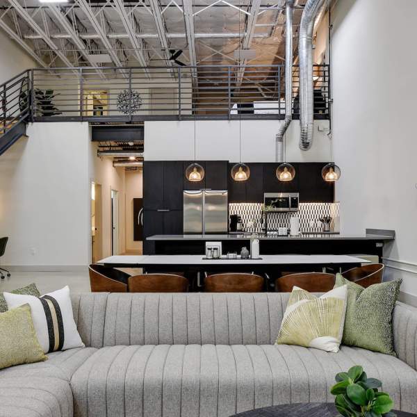 Living room view of rental with staircase