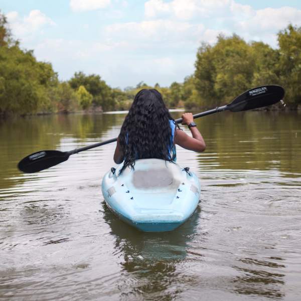 Woman kayaking on San Antonio River