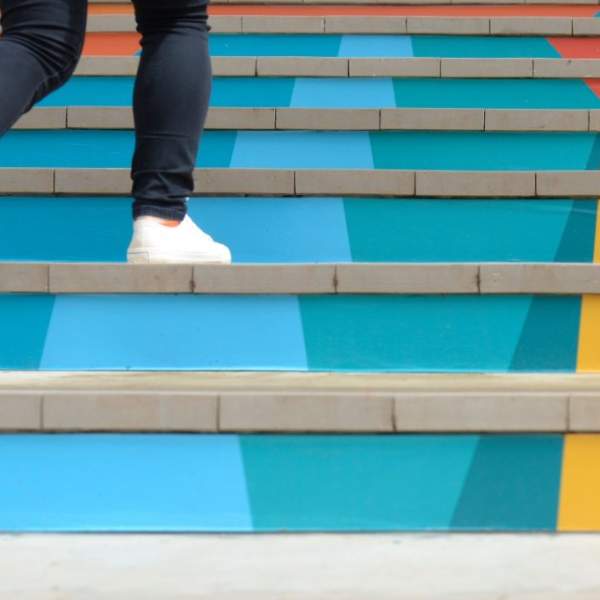 Person going up steps