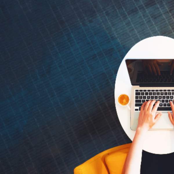 overhead person using laptop
