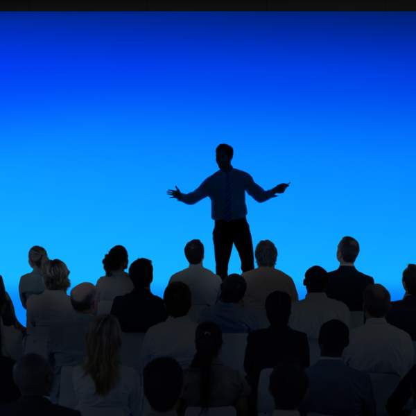 Person speaking to audience