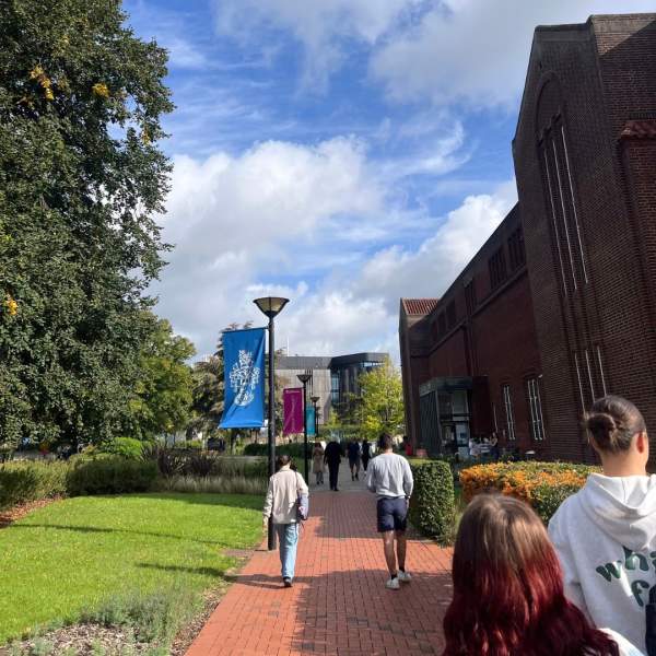 Students walking on path outside University of Southampton building