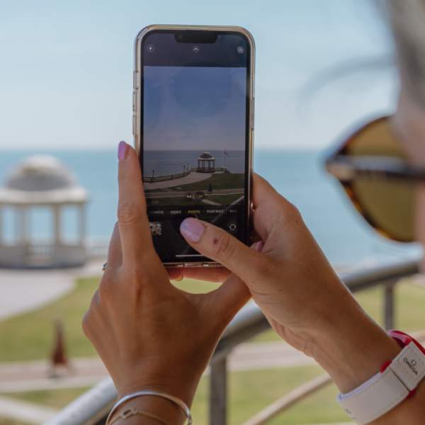 Taking a photo of the seafront from de la warr pavilion