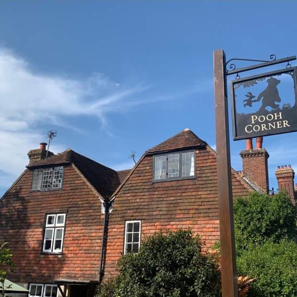 Pooh Corner sign, showing Winnie the Pooh and piglet