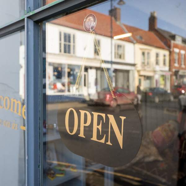 An 'open' sign in a shop window in Spilsby