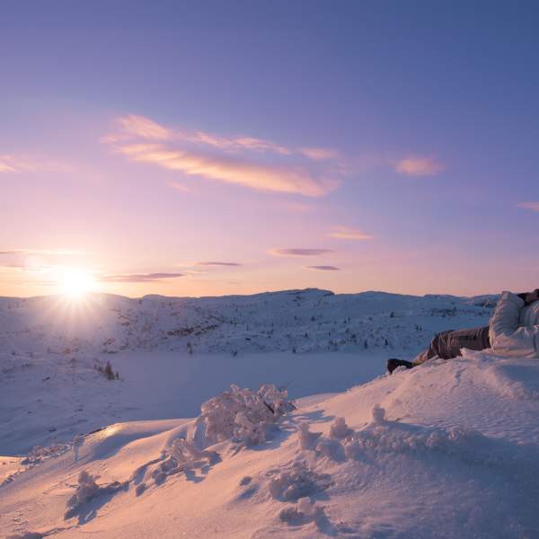 Winter landscape and sun set in the mountains. Photo