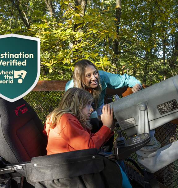 Mother and Daughter looking through telescope, with WTW verified badfe