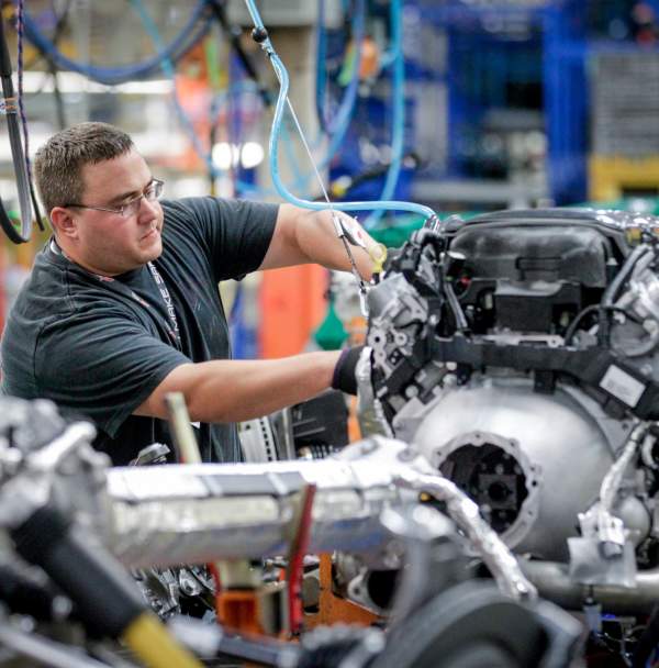 Guy working on Corvette