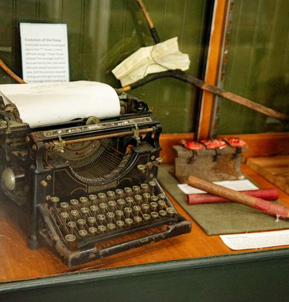 Vintage typewriter display inside the Red River Railroad Museum