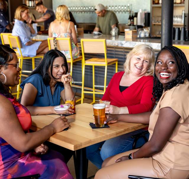 A group of ladies enjoying drinks and each other's company at Fayetteville's Haymount Truck Stop