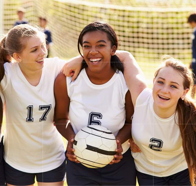 Image of soccer players at a ladies soccer game