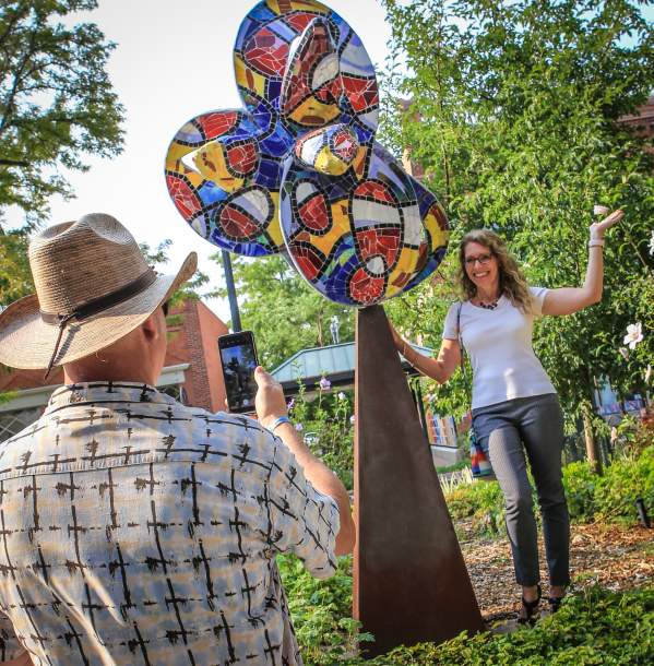 Posing with one of the many sculptures in Downtown Grand Junction