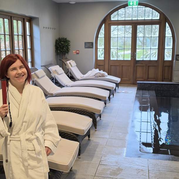 Sassy standing in the Elan Spa in a robe, at Mallory Court Hotel and Spa