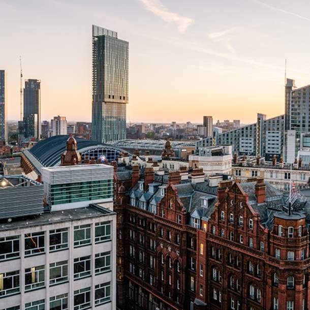 Skyline of Manchester with the Midland Hotel in the foreground and skyscrapers in the background