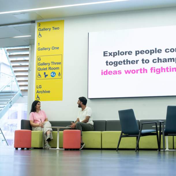2 people sat on chairs at People's History Museum